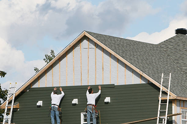 Professional Siding Replacement technician working in Colfax, IL